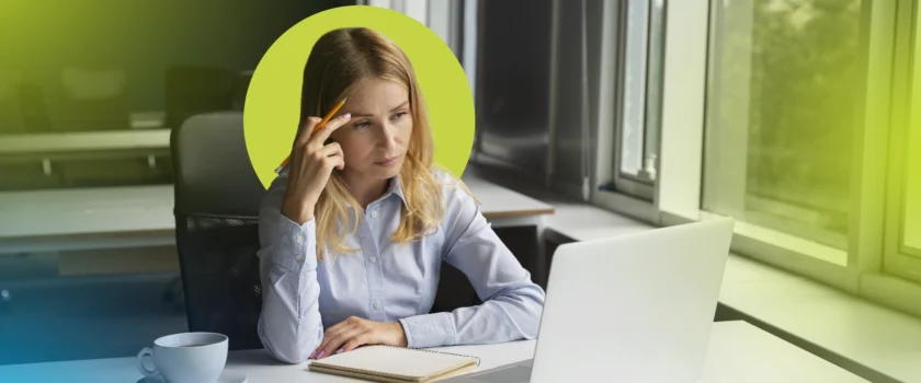 Woman thinking whether using payroll services or in-house payroll